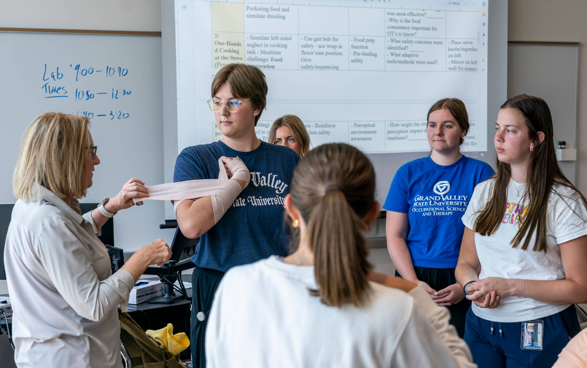 Professor and Students in a Learning Lab